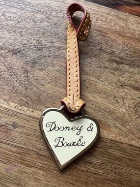 Dooney & Bourke Cream and Tan Heart Charm with Pink-Edged Strap